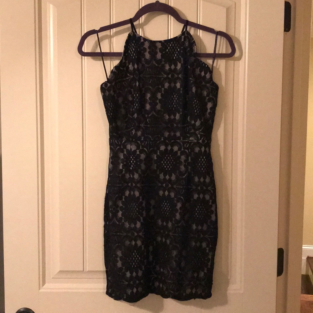 Black halter form fitting backless dress worn once
